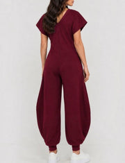 SOFT JUMPSUIT FEATURING A V-NECKLINE